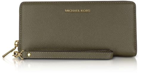 michael kors leather wallet stores|Michael Kors oversized wallet.